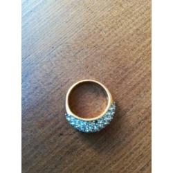 Swarovski, twee ringen en een armband