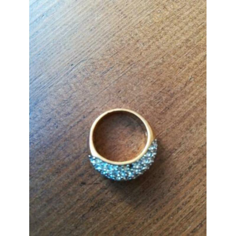 Swarovski, twee ringen en een armband
