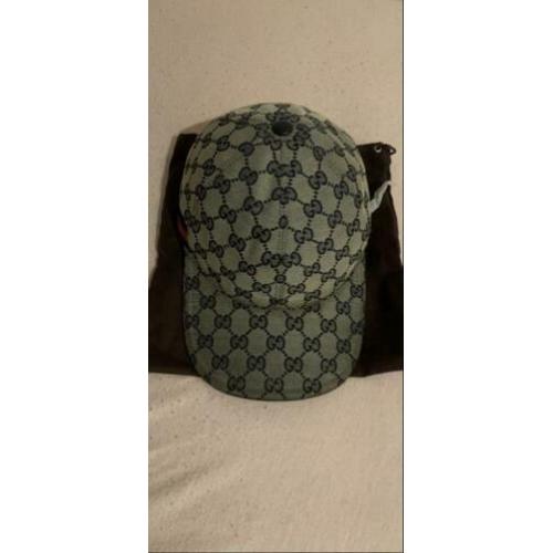 Orginele zgan Gucci pet XS.