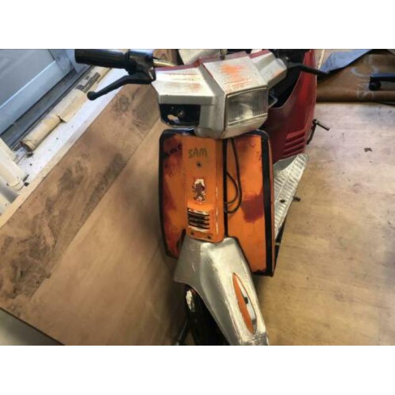 Peugeot scooter blauw kenteken opknapper blok is goed