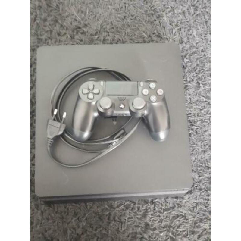 PlayStation 4 (slim) met 2 games en 1 dualshock controller