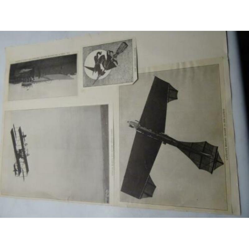 Heel oude vliegtuigfoto's uitgeknipt en in scrapbook opgepla