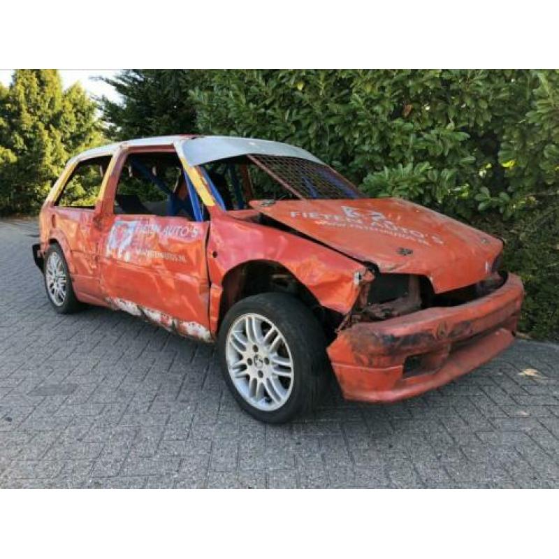Citroën AX Crossauto casco rollend en remmend