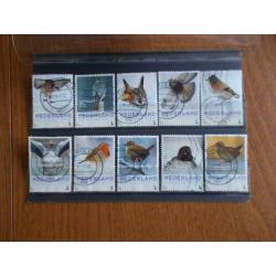 4 sets met vogels (616b)