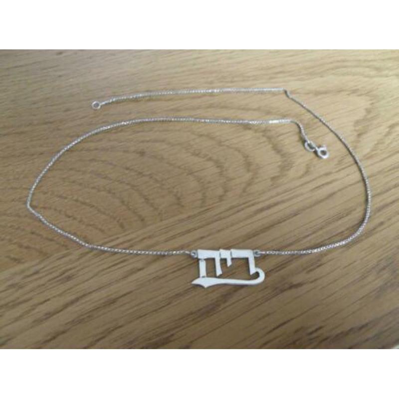naamketting goud en zilver