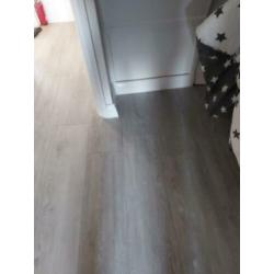 Een halfjaar oud laminaat 35 meter +/_