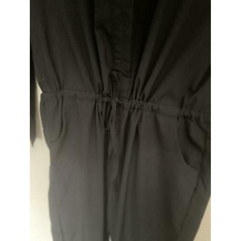 Nieuwe zwarte jumpsuit met leuke details