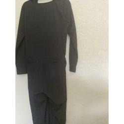 Nieuwe zwarte jumpsuit met leuke details