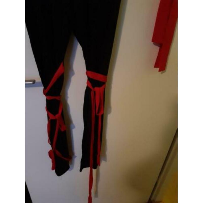 Een 1x gedragen Ninja dames carnavalspak, Maat 36/38.
