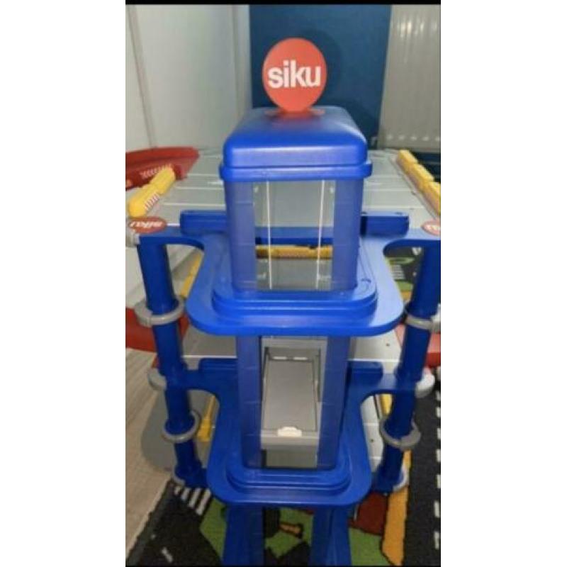 Sikuworld 2 in 1 garage met glijbaan en lift