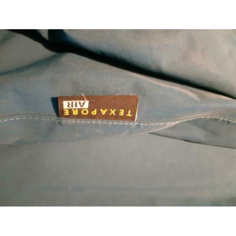 Jack wolfskin regenjas maat 140/146