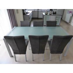 Eetkamerset glazen tafel met 6 grijze stoelen