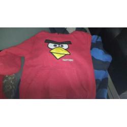 Pakket sweaters maat 128/134 4 stuks en 1 vest