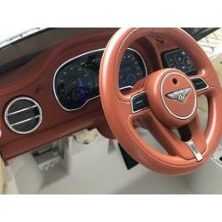 Bentley Bentayga Creme 12v Afstandsbed. / Leer / MP3/ bleuth