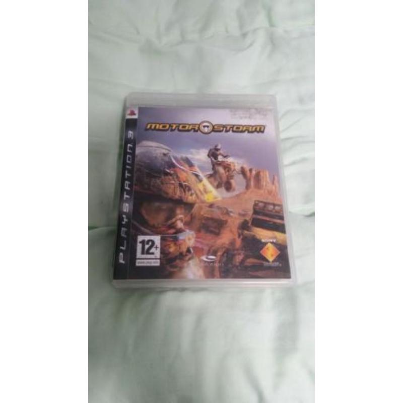 Playstation 3 met 2 controles en 4 spellen