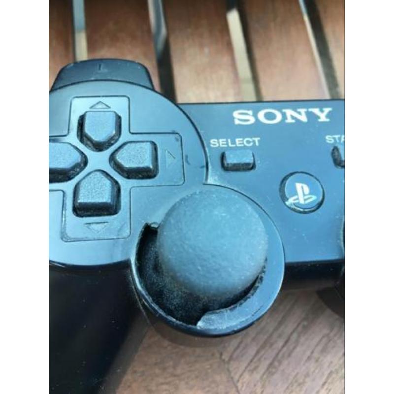 Playstation 3 slim met 2 controllers en 6 spellen