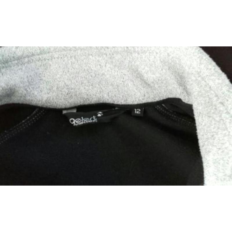 Sportief jack of vest. Maat M